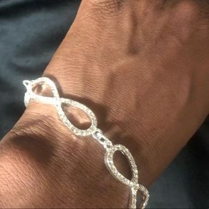 the infinity bracelet in silver and crystal